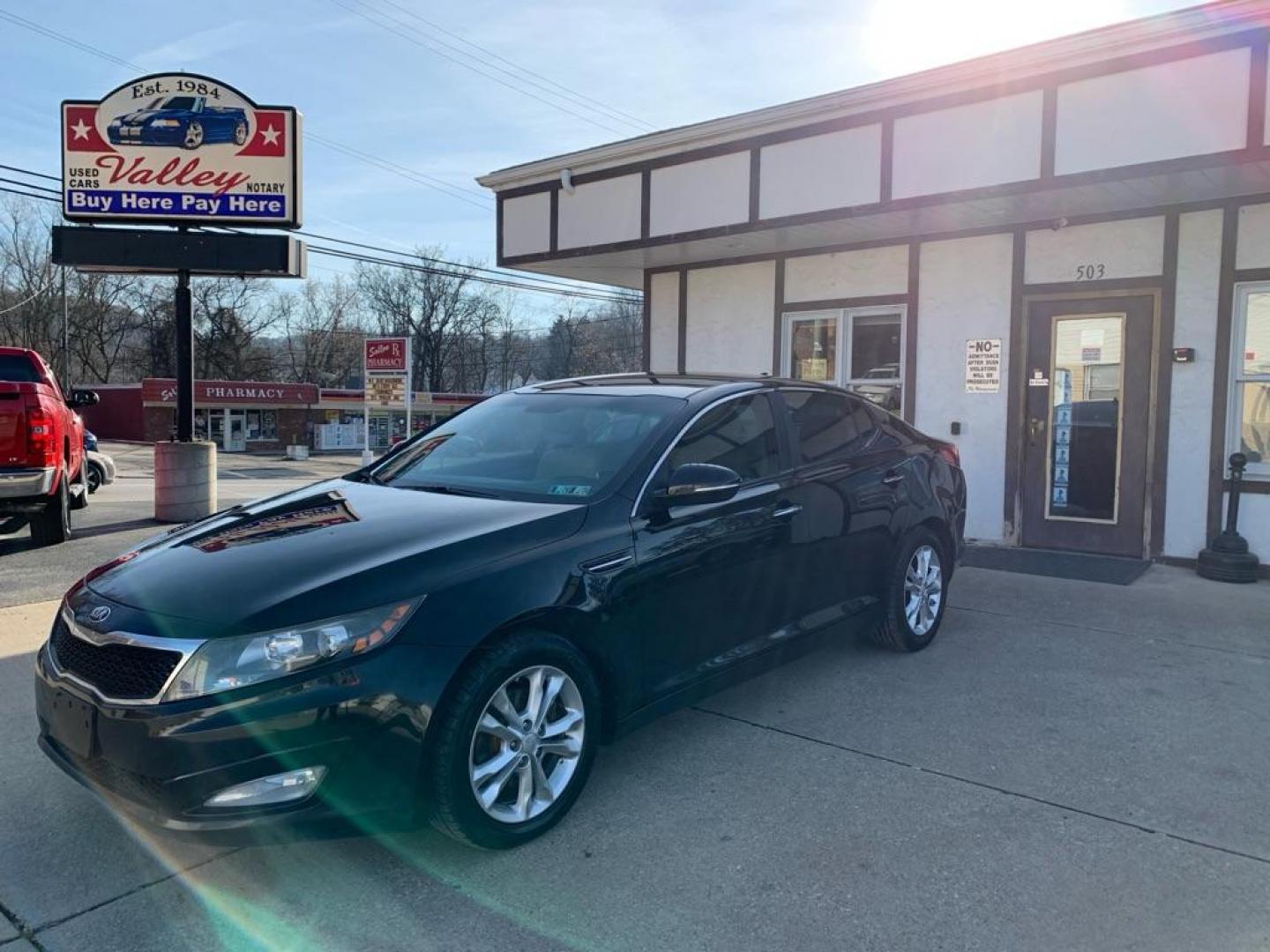 2013 BLACK KIA OPTIMA EX (5XXGN4A76DG) with an 2.4L engine, Automatic transmission, located at 503 First Street, Canonsburg, PA, 15317, (724) 745-0566, 40.266006, -80.178413 - CAR FAX AVAILABLE! AM/FM/CD/MP3, BLUETOOTH WIRELESS TECHNOLOGY, LEATHER SEAT TRIM, REMOTE KEYLESS ENTRY, PUSH BUTTON START, CRUISE CONTROL, TRACTION CONTROL SYSTEM WE FINANCE! FAST AND EASY APPROVALS! CALL US OR APPLY ONLINE: 724-745-0566 OFFICE WWW.USEDCARSCANONSBURGPA.COM AFTER HOURS QUEST - Photo#0