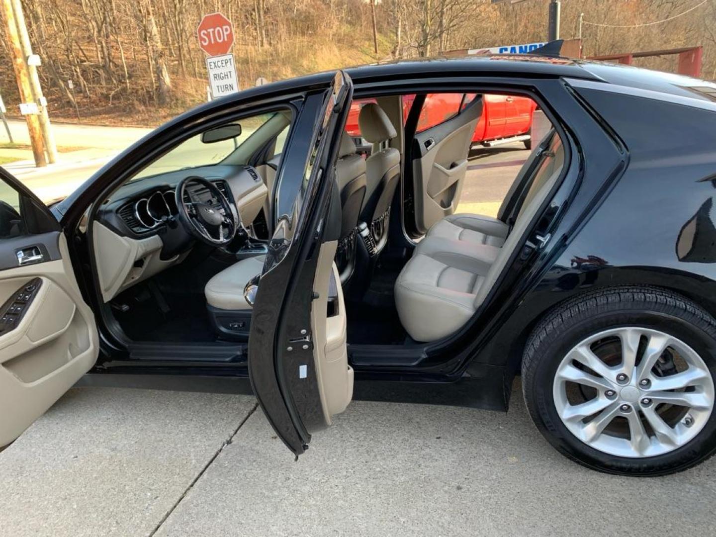 2013 BLACK KIA OPTIMA EX (5XXGN4A76DG) with an 2.4L engine, Automatic transmission, located at 503 First Street, Canonsburg, PA, 15317, (724) 745-0566, 40.266006, -80.178413 - CAR FAX AVAILABLE! AM/FM/CD/MP3, BLUETOOTH WIRELESS TECHNOLOGY, LEATHER SEAT TRIM, REMOTE KEYLESS ENTRY, PUSH BUTTON START, CRUISE CONTROL, TRACTION CONTROL SYSTEM WE FINANCE! FAST AND EASY APPROVALS! CALL US OR APPLY ONLINE: 724-745-0566 OFFICE WWW.USEDCARSCANONSBURGPA.COM AFTER HOURS QUEST - Photo#9