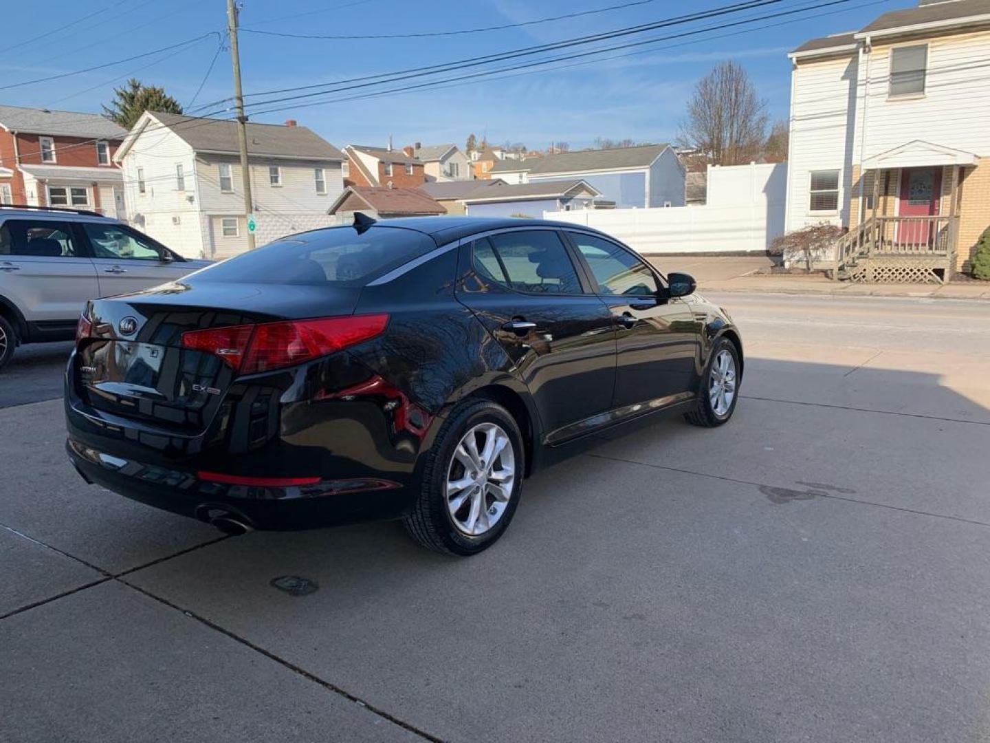 2013 BLACK KIA OPTIMA EX (5XXGN4A76DG) with an 2.4L engine, Automatic transmission, located at 503 First Street, Canonsburg, PA, 15317, (724) 745-0566, 40.266006, -80.178413 - CAR FAX AVAILABLE! AM/FM/CD/MP3, BLUETOOTH WIRELESS TECHNOLOGY, LEATHER SEAT TRIM, REMOTE KEYLESS ENTRY, PUSH BUTTON START, CRUISE CONTROL, TRACTION CONTROL SYSTEM WE FINANCE! FAST AND EASY APPROVALS! CALL US OR APPLY ONLINE: 724-745-0566 OFFICE WWW.USEDCARSCANONSBURGPA.COM AFTER HOURS QUEST - Photo#2
