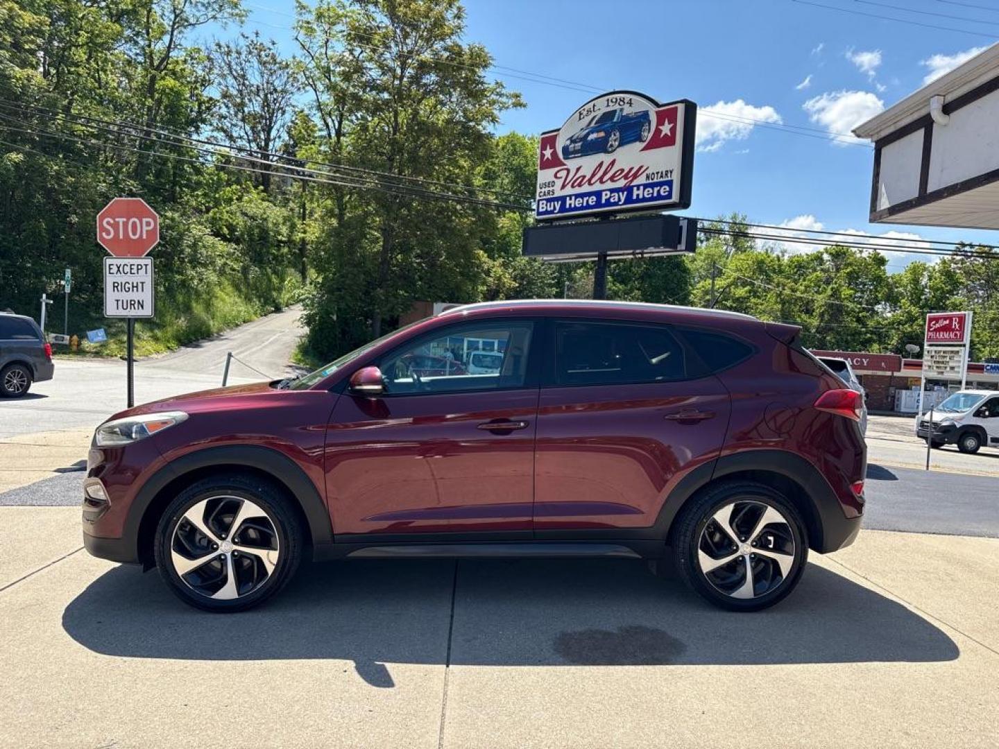 2016 RED HYUNDAI TUCSON LIMITED (KM8J3CA20GU) with an 1.6L engine, Automatic transmission, located at 503 First Street, Canonsburg, PA, 15317, (724) 745-0566, 40.266006, -80.178413 - Photo#1