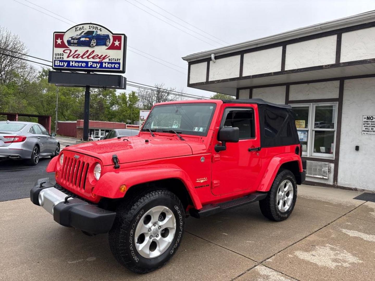 2013 RED JEEP WRANGLER SAHARA (1C4AJWBG4DL) with an 3.6L engine, Automatic transmission, located at 503 First Street, Canonsburg, PA, 15317, (724) 745-0566, 40.266006, -80.178413 - * BRIGHT RED * ONE OWNER * CLEAN CARFAX * LEATHER INTERIOR * AUTOMATIC * 4WD * SAHARA PACKAGE * 3.6L V6 * ONLY 48K MILES If you've been searching for a clean, low-mileage Wrangler, this is the one! Hard to find condition with only 48k miles. Its ready for summer cruising or weekend adven - Photo#0
