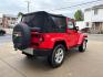 2013 RED JEEP WRANGLER SAHARA (1C4AJWBG4DL) with an 3.6L engine, Automatic transmission, located at 503 First Street, Canonsburg, PA, 15317, (724) 745-0566, 40.266006, -80.178413 - * BRIGHT RED * ONE OWNER * CLEAN CARFAX * LEATHER INTERIOR * AUTOMATIC * 4WD * SAHARA PACKAGE * 3.6L V6 * ONLY 48K MILES If you've been searching for a clean, low-mileage Wrangler, this is the one! Hard to find condition with only 48k miles. Its ready for summer cruising or weekend adven - Photo#4