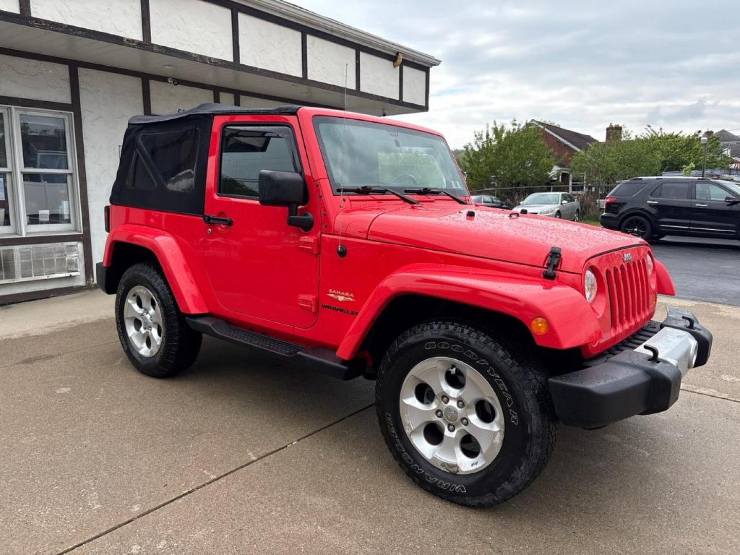 2013 RED JEEP WRANGLER SAHARA (1C4AJWBG4DL) with an 3.6L engine, Automatic transmission, located at 503 First Street, Canonsburg, PA, 15317, (724) 745-0566, 40.266006, -80.178413 - * BRIGHT RED * ONE OWNER * CLEAN CARFAX * LEATHER INTERIOR * AUTOMATIC * 4WD * SAHARA PACKAGE * 3.6L V6 * ONLY 48K MILES If you've been searching for a clean, low-mileage Wrangler, this is the one! Hard to find condition with only 48k miles. Its ready for summer cruising or weekend adven - Photo#6