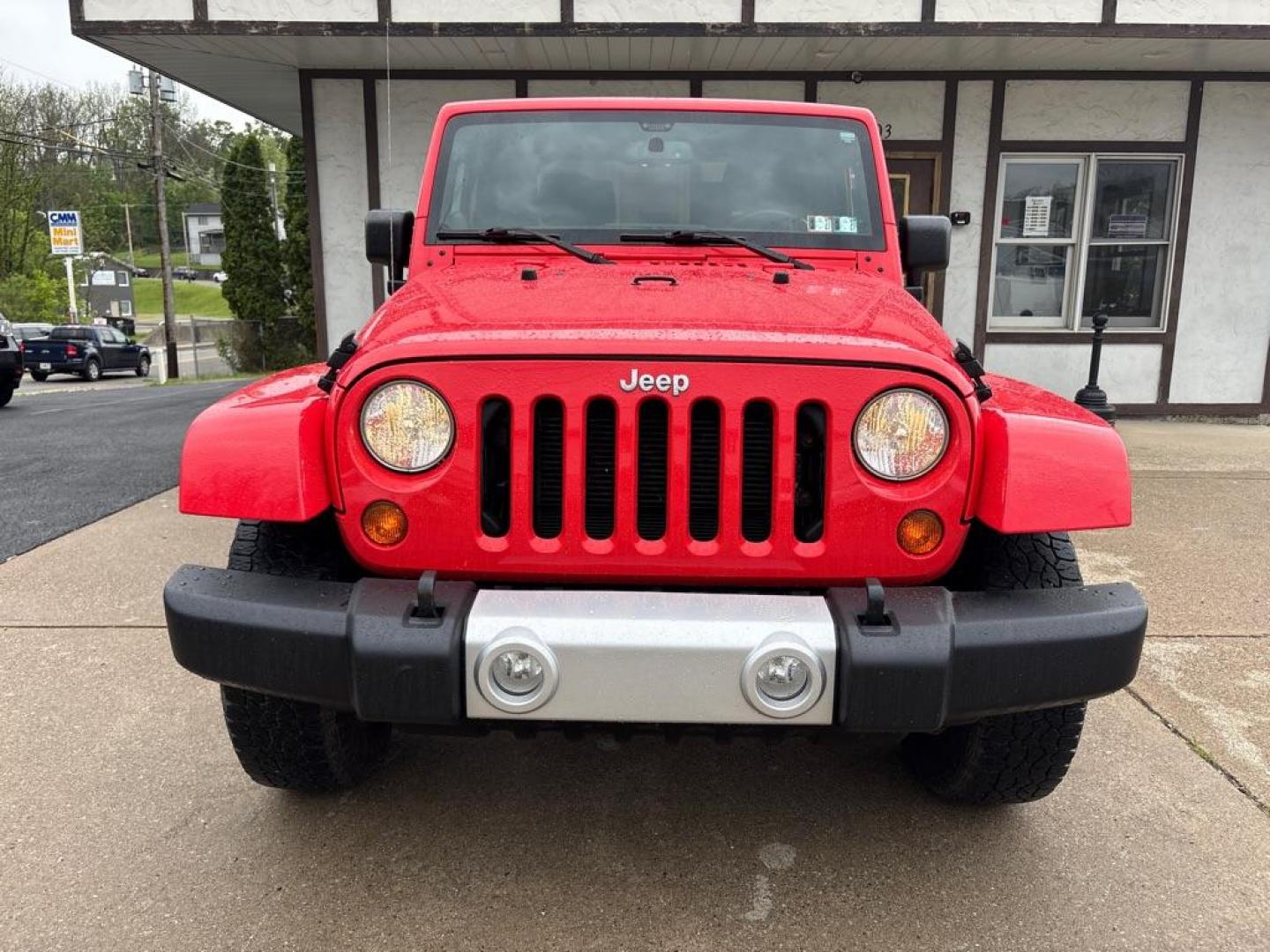 2013 RED JEEP WRANGLER SAHARA (1C4AJWBG4DL) with an 3.6L engine, Automatic transmission, located at 503 First Street, Canonsburg, PA, 15317, (724) 745-0566, 40.266006, -80.178413 - * BRIGHT RED * ONE OWNER * CLEAN CARFAX * LEATHER INTERIOR * AUTOMATIC * 4WD * SAHARA PACKAGE * 3.6L V6 * ONLY 48K MILES If you've been searching for a clean, low-mileage Wrangler, this is the one! Hard to find condition with only 48k miles. Its ready for summer cruising or weekend adven - Photo#7