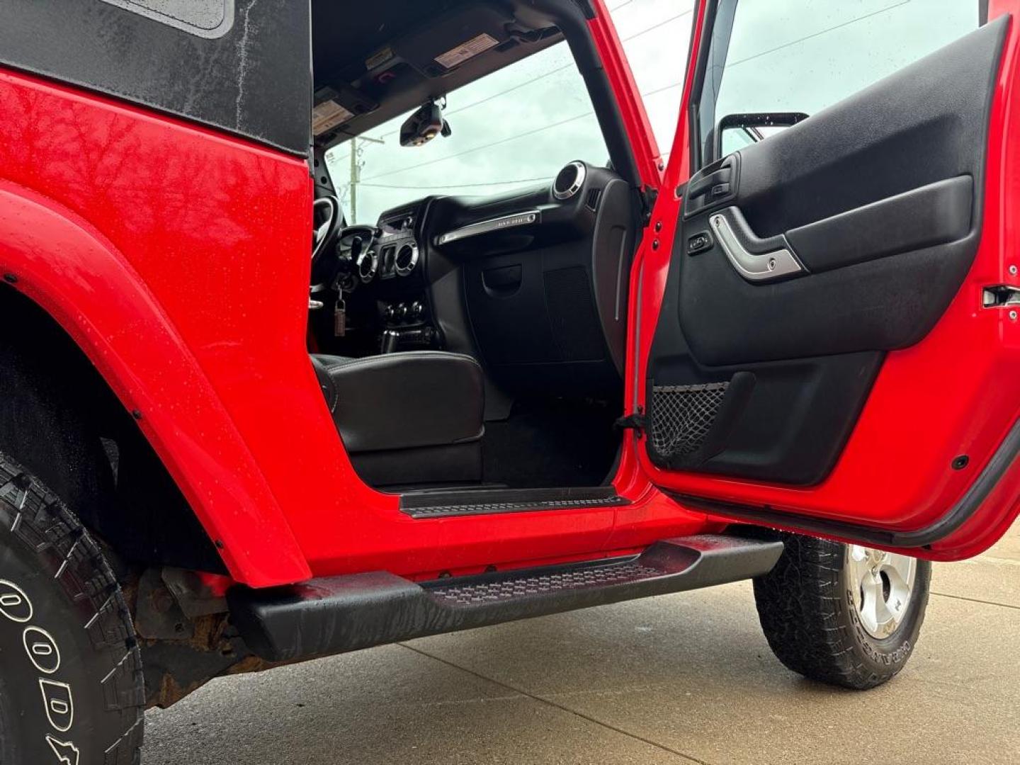 2013 RED JEEP WRANGLER SAHARA (1C4AJWBG4DL) with an 3.6L engine, Automatic transmission, located at 503 First Street, Canonsburg, PA, 15317, (724) 745-0566, 40.266006, -80.178413 - * BRIGHT RED * ONE OWNER * CLEAN CARFAX * LEATHER INTERIOR * AUTOMATIC * 4WD * SAHARA PACKAGE * 3.6L V6 * ONLY 48K MILES If you've been searching for a clean, low-mileage Wrangler, this is the one! Hard to find condition with only 48k miles. Its ready for summer cruising or weekend adven - Photo#13