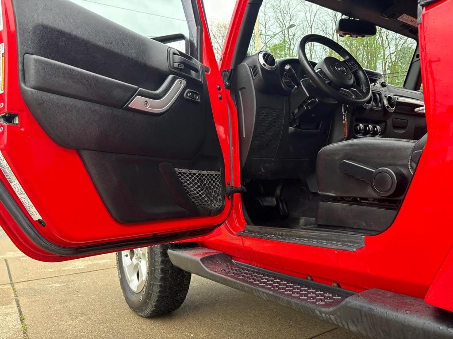 2013 RED JEEP WRANGLER SAHARA (1C4AJWBG4DL) with an 3.6L engine, Automatic transmission, located at 503 First Street, Canonsburg, PA, 15317, (724) 745-0566, 40.266006, -80.178413 - * BRIGHT RED * ONE OWNER * CLEAN CARFAX * LEATHER INTERIOR * AUTOMATIC * 4WD * SAHARA PACKAGE * 3.6L V6 * ONLY 48K MILES If you've been searching for a clean, low-mileage Wrangler, this is the one! Hard to find condition with only 48k miles. Its ready for summer cruising or weekend adven - Photo#15