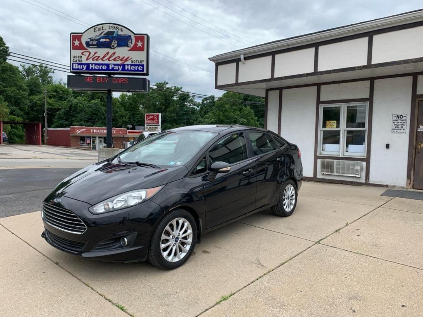 2014 BLACK FORD FIESTA SE (3FADP4BJ7EM) with an 1.6L engine, Automatic transmission, located at 503 First Street, Canonsburg, PA, 15317, (724) 745-0566, 40.266006, -80.178413 - Photo#0