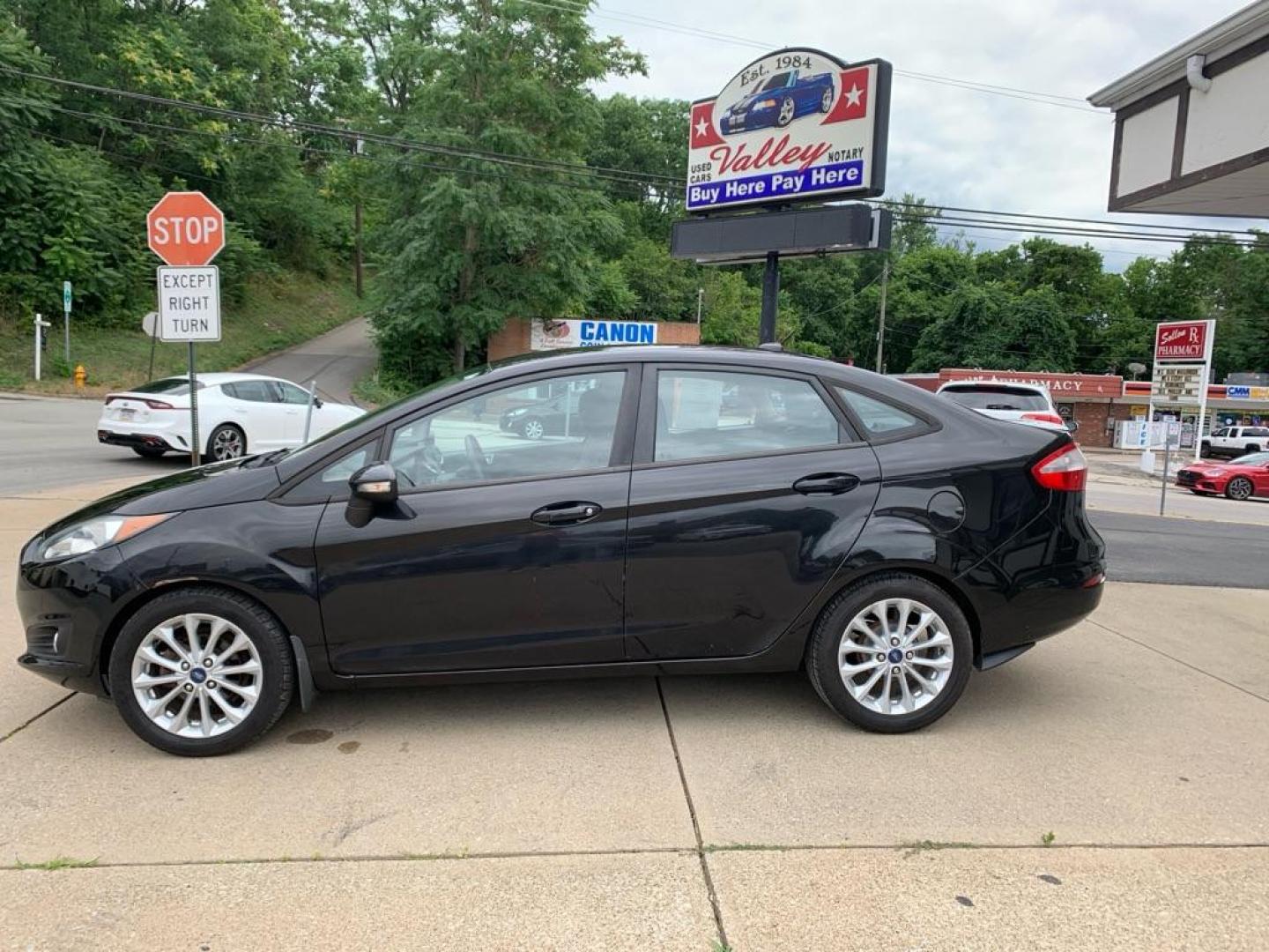2014 BLACK FORD FIESTA SE (3FADP4BJ7EM) with an 1.6L engine, Automatic transmission, located at 503 First Street, Canonsburg, PA, 15317, (724) 745-0566, 40.266006, -80.178413 - Photo#1