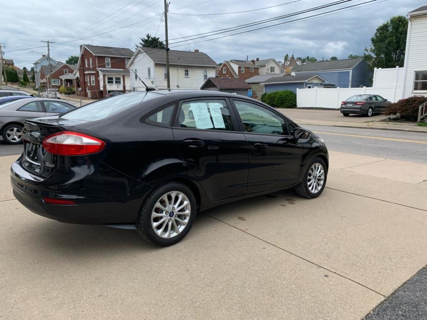 2014 BLACK FORD FIESTA SE (3FADP4BJ7EM) with an 1.6L engine, Automatic transmission, located at 503 First Street, Canonsburg, PA, 15317, (724) 745-0566, 40.266006, -80.178413 - Photo#4