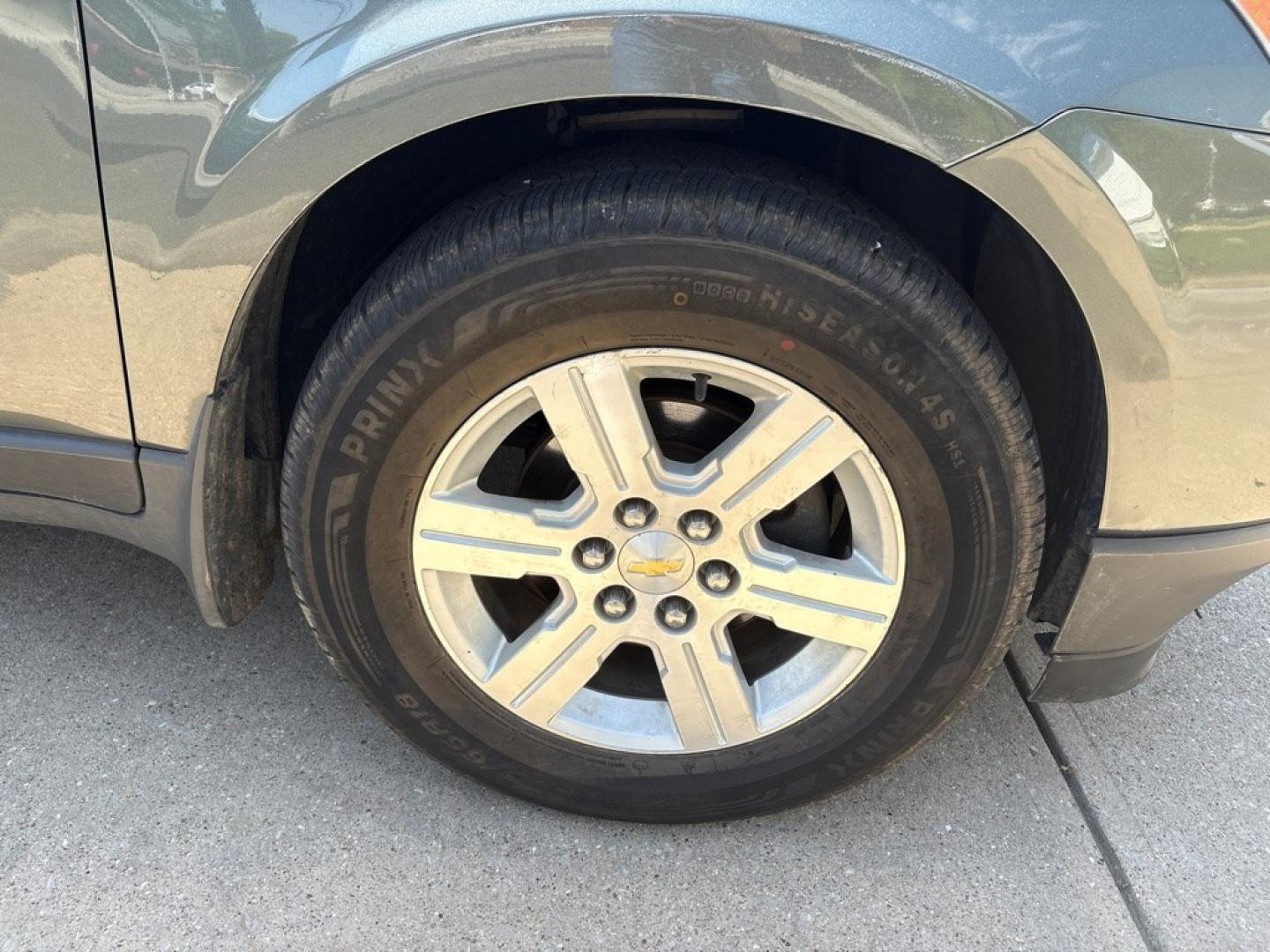 2011 GREEN CHEVROLET TRAVERSE LT (1GNKVJED5BJ) with an 3.6L engine, Automatic transmission, located at 503 First Street, Canonsburg, PA, 15317, (724) 745-0566, 40.266006, -80.178413 - THIS VEHICLE IS UNDER CONSIGNMENT CLEAN CAR FAX! MPG: 16 CITY / 23 HIGHWAY AWD 3RD ROW 2ND ROW CAPTIAN CHAIRS ON STAR REMOTE START BACK UP CAMERA LEATHER SUNROOF REAR POWER LIFT GATE AM/FM/CD/USB/XM/MP3/ON STAR BOSE 10 SPEAKER PREMIUM SOUND TRI-ZONE CLIMATE CONTROL WE FINANCE! F- Photo#12