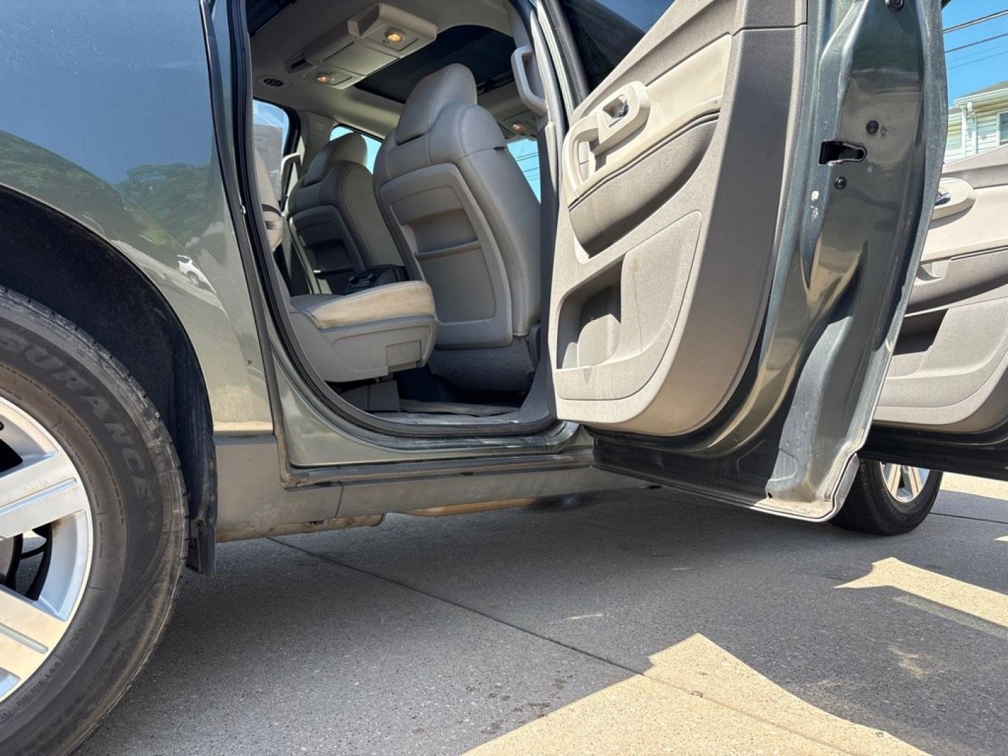 2011 GREEN CHEVROLET TRAVERSE LT (1GNKVJED5BJ) with an 3.6L engine, Automatic transmission, located at 503 First Street, Canonsburg, PA, 15317, (724) 745-0566, 40.266006, -80.178413 - THIS VEHICLE IS UNDER CONSIGNMENT CLEAN CAR FAX! MPG: 16 CITY / 23 HIGHWAY AWD 3RD ROW 2ND ROW CAPTIAN CHAIRS ON STAR REMOTE START BACK UP CAMERA LEATHER SUNROOF REAR POWER LIFT GATE AM/FM/CD/USB/XM/MP3/ON STAR BOSE 10 SPEAKER PREMIUM SOUND TRI-ZONE CLIMATE CONTROL WE FINANCE! F- Photo#14