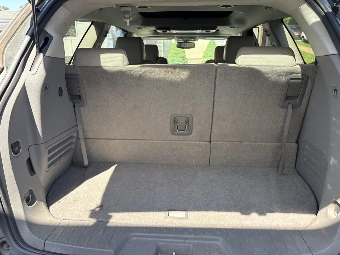 2011 GREEN CHEVROLET TRAVERSE LT (1GNKVJED5BJ) with an 3.6L engine, Automatic transmission, located at 503 First Street, Canonsburg, PA, 15317, (724) 745-0566, 40.266006, -80.178413 - THIS VEHICLE IS UNDER CONSIGNMENT CLEAN CAR FAX! MPG: 16 CITY / 23 HIGHWAY AWD 3RD ROW 2ND ROW CAPTIAN CHAIRS ON STAR REMOTE START BACK UP CAMERA LEATHER SUNROOF REAR POWER LIFT GATE AM/FM/CD/USB/XM/MP3/ON STAR BOSE 10 SPEAKER PREMIUM SOUND TRI-ZONE CLIMATE CONTROL WE FINANCE! F- Photo#15
