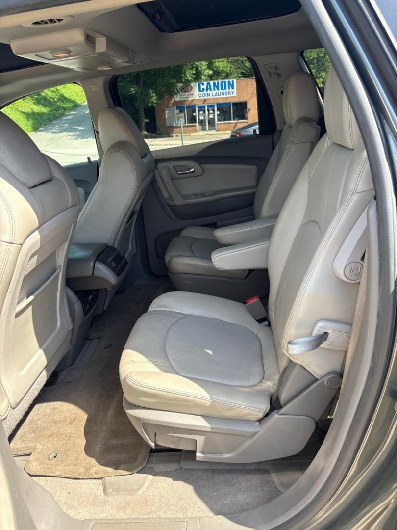 2011 GREEN CHEVROLET TRAVERSE LT (1GNKVJED5BJ) with an 3.6L engine, Automatic transmission, located at 503 First Street, Canonsburg, PA, 15317, (724) 745-0566, 40.266006, -80.178413 - THIS VEHICLE IS UNDER CONSIGNMENT CLEAN CAR FAX! MPG: 16 CITY / 23 HIGHWAY AWD 3RD ROW 2ND ROW CAPTIAN CHAIRS ON STAR REMOTE START BACK UP CAMERA LEATHER SUNROOF REAR POWER LIFT GATE AM/FM/CD/USB/XM/MP3/ON STAR BOSE 10 SPEAKER PREMIUM SOUND TRI-ZONE CLIMATE CONTROL WE FINANCE! F- Photo#19