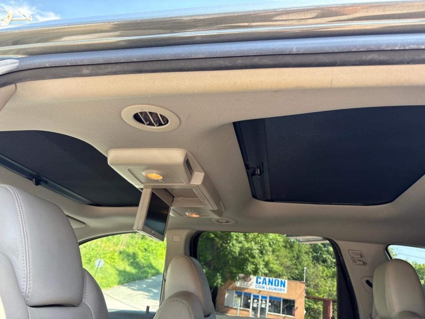 2011 GREEN CHEVROLET TRAVERSE LT (1GNKVJED5BJ) with an 3.6L engine, Automatic transmission, located at 503 First Street, Canonsburg, PA, 15317, (724) 745-0566, 40.266006, -80.178413 - THIS VEHICLE IS UNDER CONSIGNMENT CLEAN CAR FAX! MPG: 16 CITY / 23 HIGHWAY AWD 3RD ROW 2ND ROW CAPTIAN CHAIRS ON STAR REMOTE START BACK UP CAMERA LEATHER SUNROOF REAR POWER LIFT GATE AM/FM/CD/USB/XM/MP3/ON STAR BOSE 10 SPEAKER PREMIUM SOUND TRI-ZONE CLIMATE CONTROL WE FINANCE! F- Photo#24